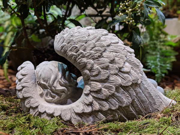 Angel in wings stone ornament