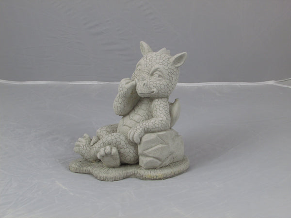 Nose picking dragon stone ornament