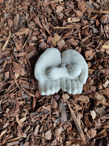 Baby in Hand Decorative Stone Ornament