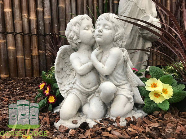 Angels kiss stone ornament