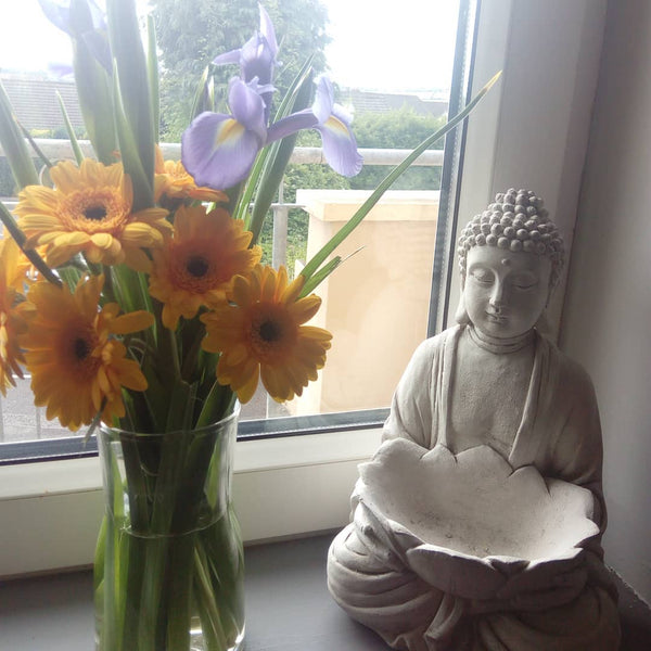 Buddha with stone font